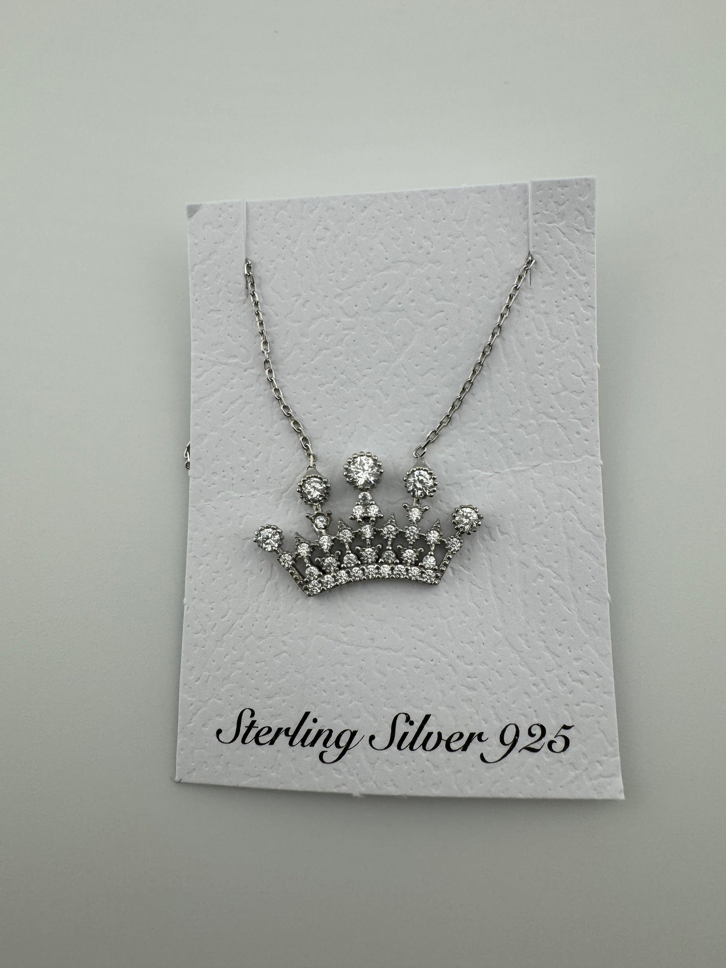 Crown Pendant Necklace Queen, Corona Jewelry Sterling Silver Round Cubic Zirconiaadjustable length of 16-18 inches.